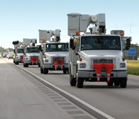 During late summer 2004, Florida was battered by hurricanes, leaving millions of people without power. Crews from New York and New England travelled to help restore power.